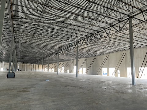 Commercial tilt-wall construction site — structural steel framework
