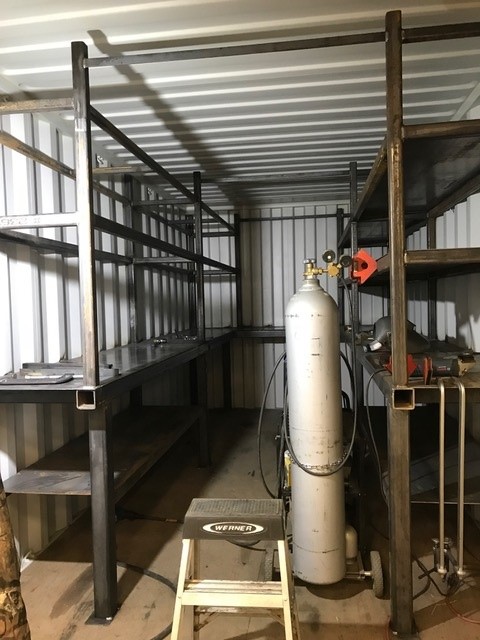 Container interior shelving — custom steel storage fabrication