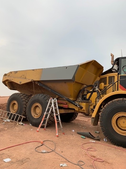 Heavy equipment dump truck repair — on-site mobile welding